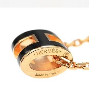 Hermes Black and Gold Pendant Necklace
